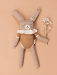 a large cuddly toy made of alpaca bunny ochre bodysuit
