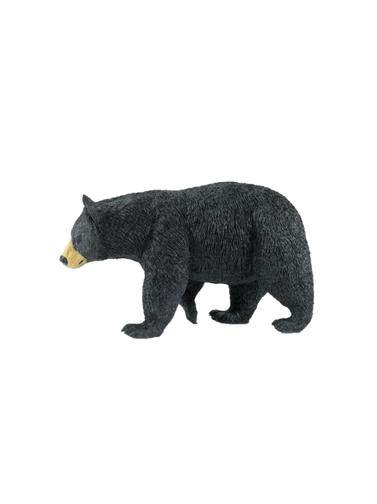 A large figurine of a black bear