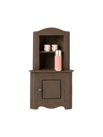 A miniature corner cupboard