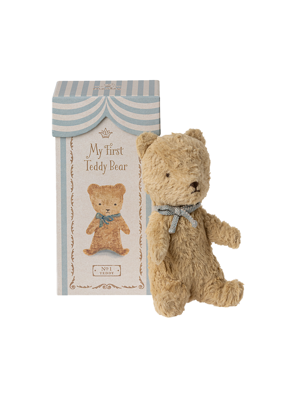 The first teddy bear in a gift box