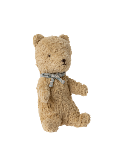 The first teddy bear in a gift box