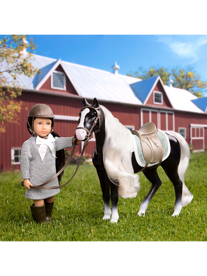 Un pequeño muñeco jockey con un caballo.