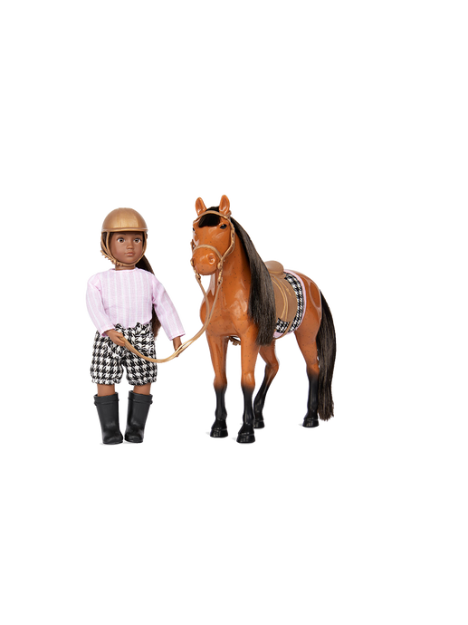 Un pequeño muñeco jockey con un caballo. chanda & cinnamon