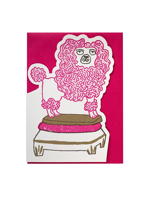 A decorative card with an envelope poodle