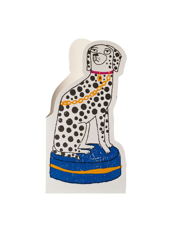 A decorative card with an envelope dalmatian