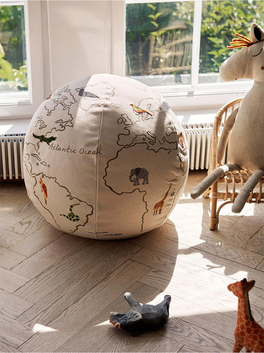 Round pouffe with a world map