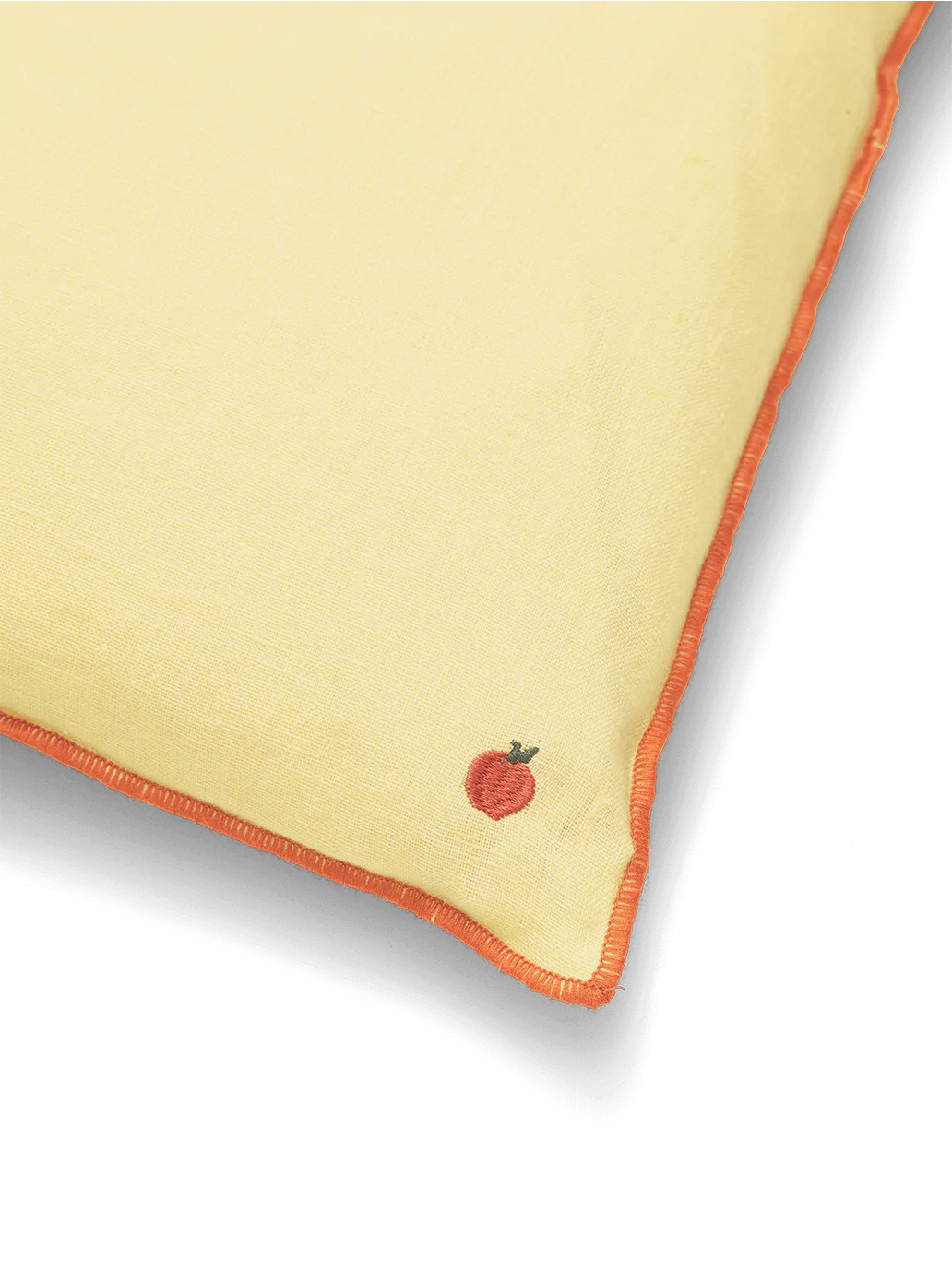 Almohada de lino con costuras en contraste.