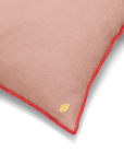 Linen pillow with contrasting stitching dusty rose