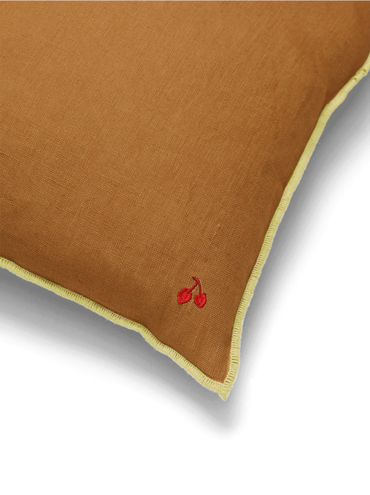 Linen pillow with contrasting stitching