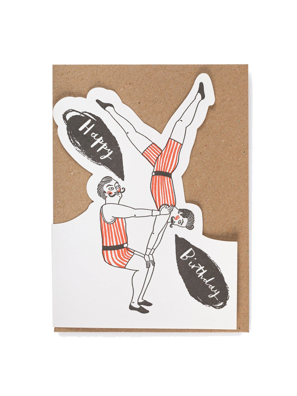 A decorative greeting card with an envelope happy birthday acrobats