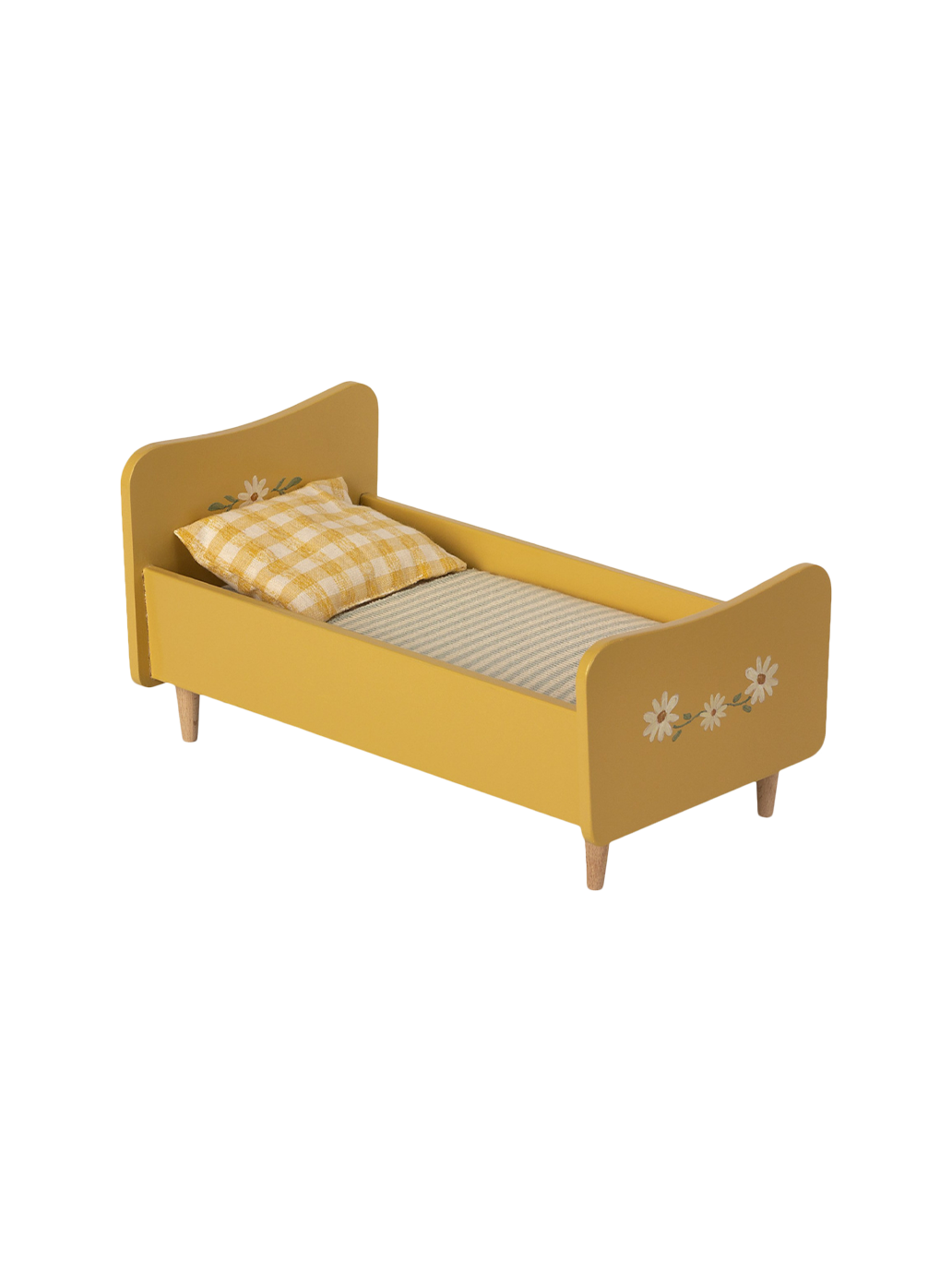 minicuna de madera con ropa de cama