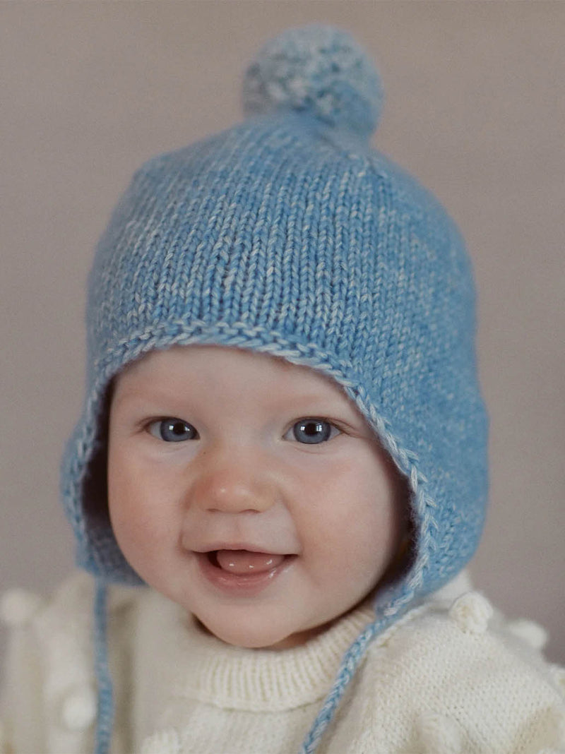 Gorro bebé de lana merino con pompón