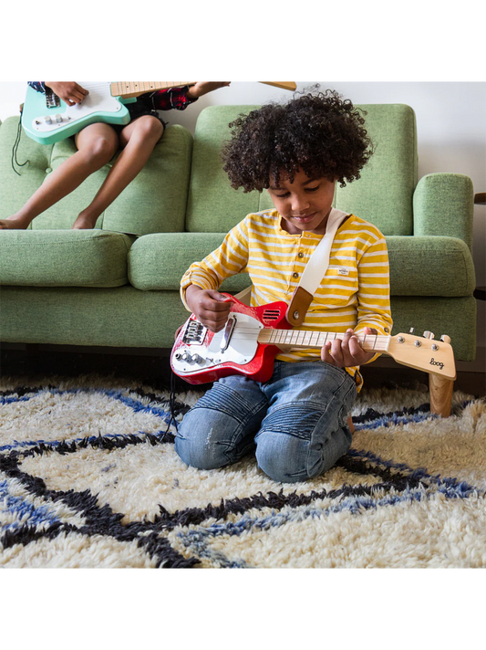 Mini guitarra eléctrica loog para niños.