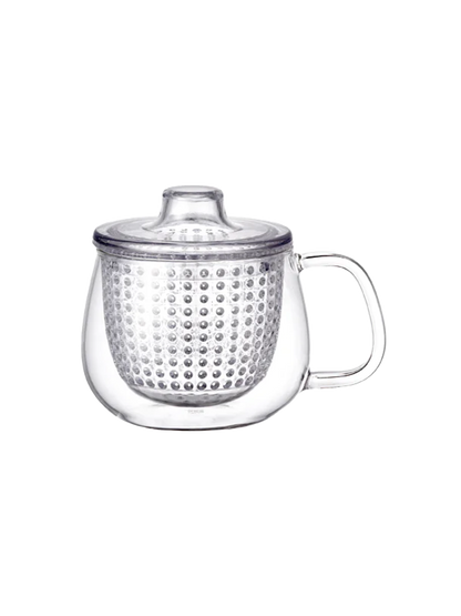 Taza de té de cristal con infusor.