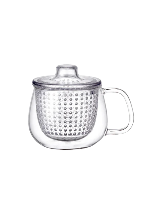 Taza de té de cristal con infusor.