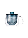 Taza de té de cristal con infusor.