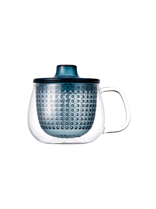 Taza de té de cristal con infusor.