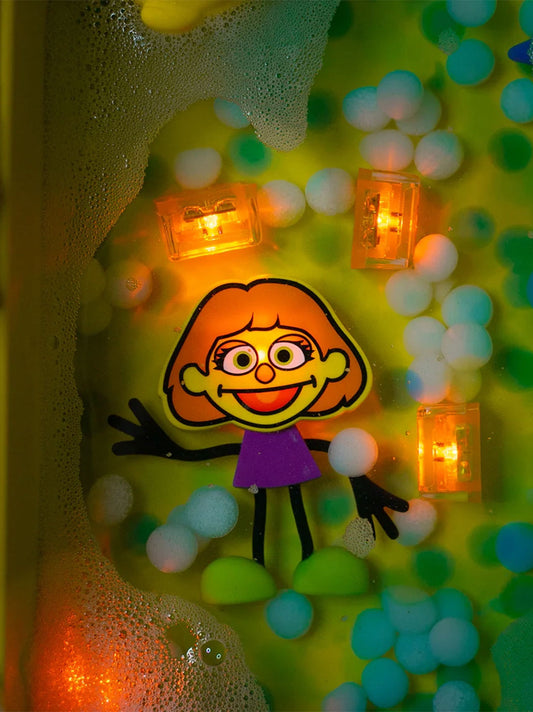 Sensory cubes glowing in water Sesame Street