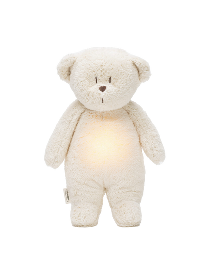 humming organic teddy bear with a bedside lamp