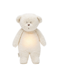 humming organic teddy bear with a bedside lamp