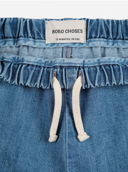 Baby Poma multicolor denim pants