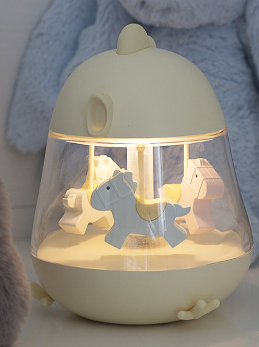 Bedside lamp with a music box