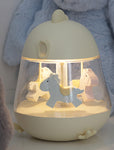 Bedside lamp with a music box yellow