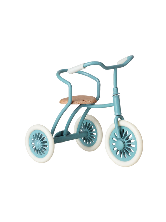 Bicicleta triciclo en miniatura.
