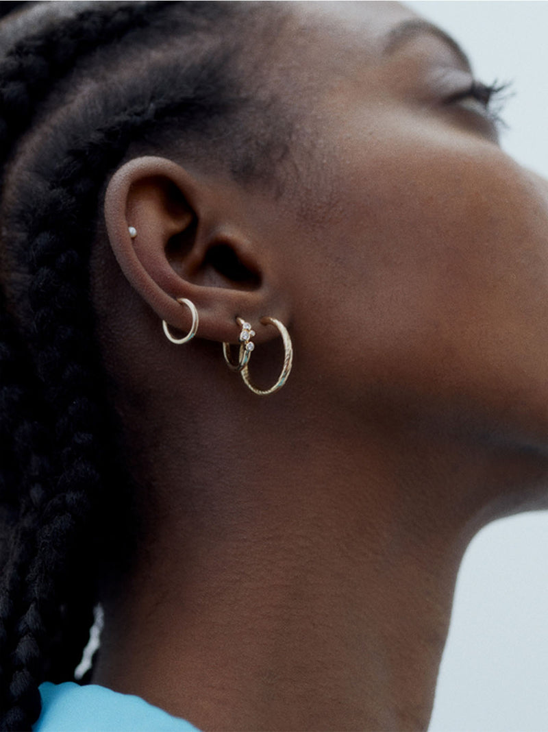 Gold earring Huggie