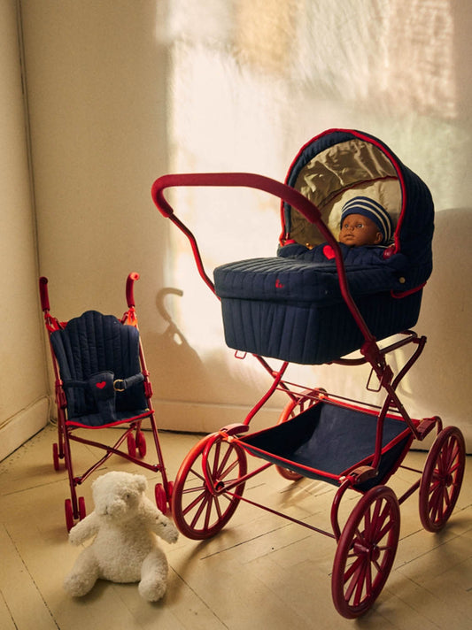 A stroller for dolls with an organizer